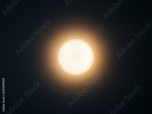 Bright sun glowing with soft light in dark space