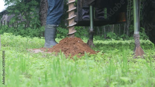 engineering geological surveys, environmental soil analysis, a drill drills into the soil
