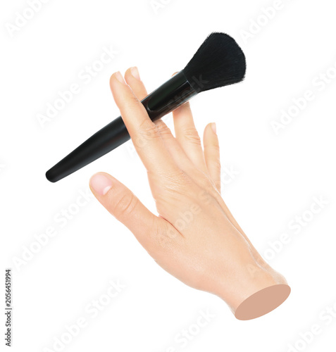 Fotografie Woman hand holds black cosmetics brush, isolated on transparent background, cosmetics and visage concept