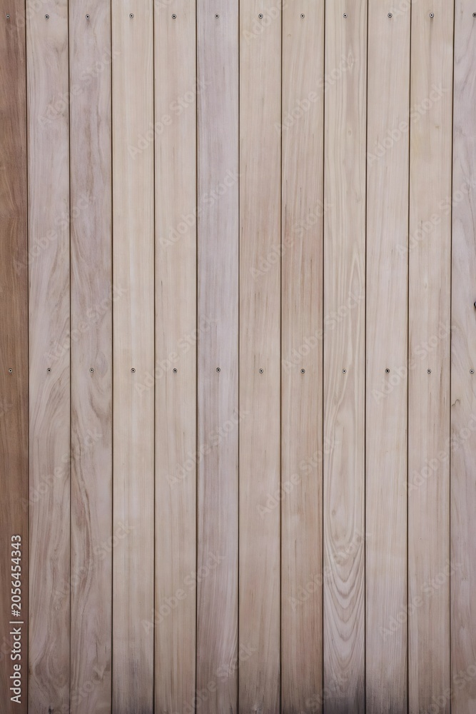 Fototapeta premium Vertical Wooden Planks Light Natural Finish Textured Wall Surface