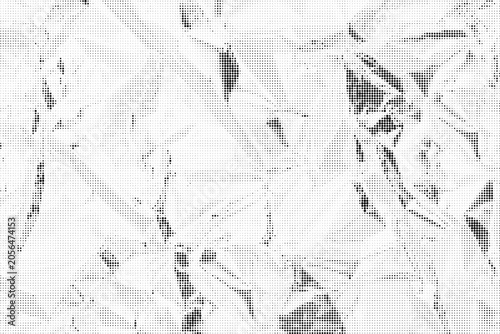 Photos A close-up view of a clear crystal structure with sharp facets and edges