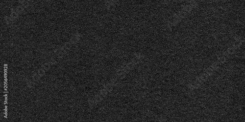 Black grain noise texture background. Dark digital film grain overlay for abstract design. Distressed monochrome surface pattern for graphic element and modern wallpaper