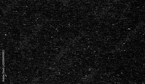 Grain noise texture on black background. Grunge effect with dust and scratch pattern. Vintage film overlay for design. Abstract dark rough surface with static grit for digital graphic