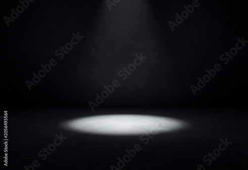 Minimalist black studio interior template with focused light beam