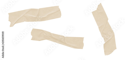 Fotografija Set of three wrinkled brown adhesive tape pieces with natural shadow, isolated on transparent background