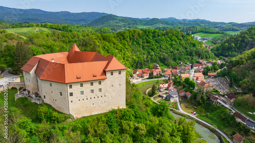 Cuadro en lienzo Aerial drone view looks down at dense historic center of Celje city