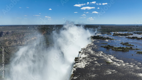 Explore the breathtaking view of Victoria Falls in Zimbabwe during daytime