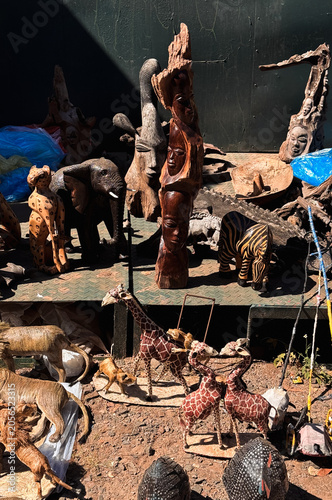 Wood carvings of animals and figures displayed for sale near Victoria Falls Zimbabwe