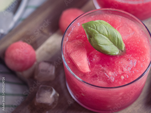 Fresh watermelon granita with basil in glass cups