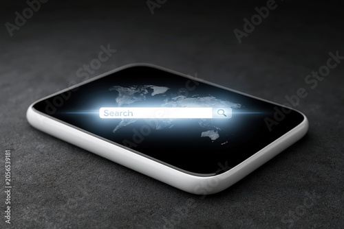 Search bar displayed on a mobile device with a world map in the background showing technology and connectivity in today's world