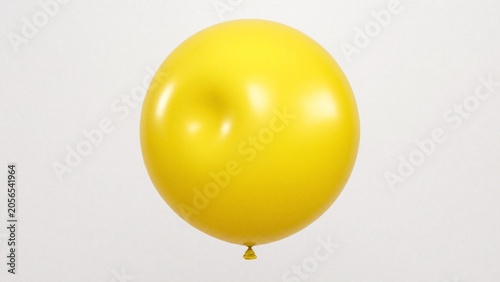 Bilde på lerret A perfectly round yellow balloon with a small, temporary bulge appearing on its smooth surface