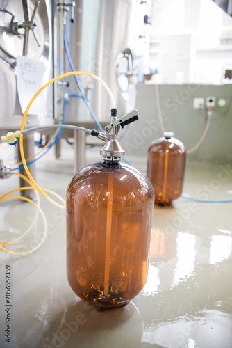 Obraz na płótnie Fermentation vessel with tubing in brewery laboratory