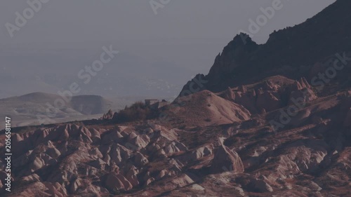 Explore Cappadocias unique rock formations and ancient landscape in Turkey