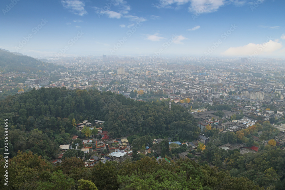 Obraz premium Aerial view of Dujiangyan City from Yulei Pavilion at Yulei Mountain in autumn, Sichuan Province of China