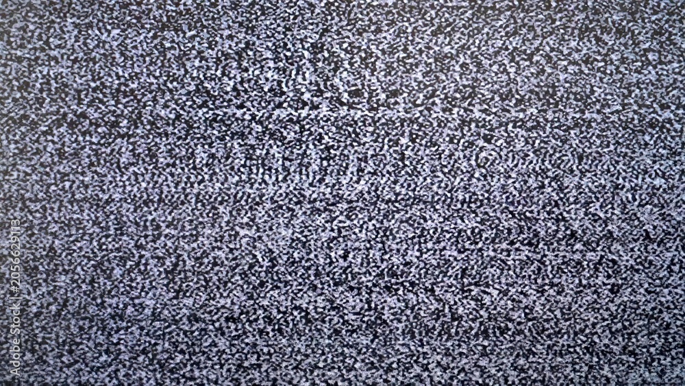 Fototapeta premium Close-up of static tv screen with black and white noise