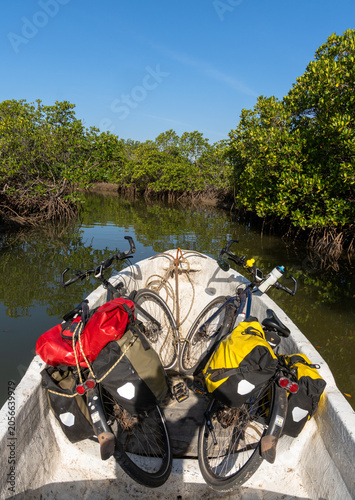 Fotografía Bicycles loaded on a boat for a river crossing, Senegal