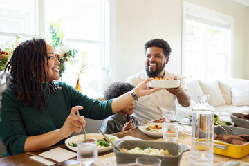 Family Enjoys Dinner at Home During the Evening Hours