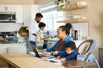 Family Working and Cooking Together in a Home Kitchen