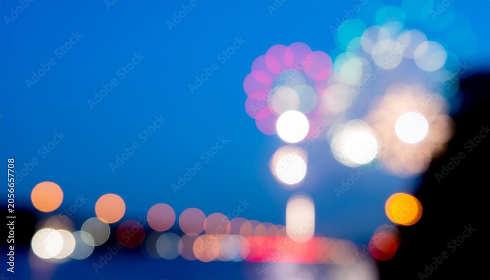 Fototapeta premium Blurred fireworks bokeh background for July 4 night celebration
