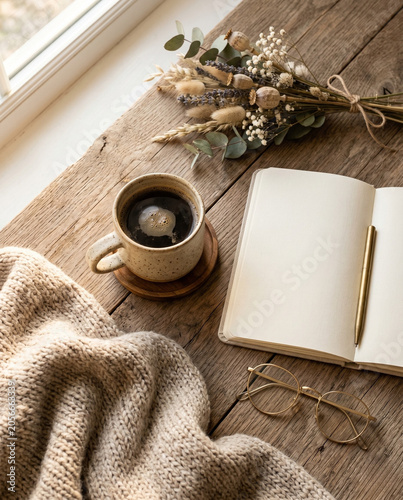 Cozy Morning Flat Lay with Coffee Cup Blank Notebook and Dried Flowers in Soft Natural Light