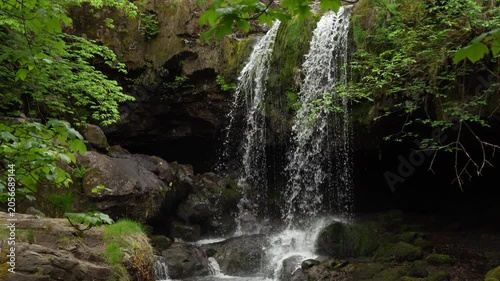 Magical Waterfall Hidden in Dense Green Woodland Cave