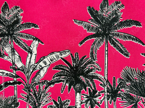 Bold tropical fabric pattern featuring black and white palm trees and exotic foliage on a vibrant pink background. Stylish jungle-inspired textile design perfect for fashion, decor and prints.