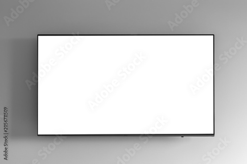 Photography Flat screen TV with green chroma key display mounted on a gray white wall