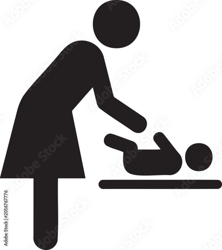 Mother changing baby diaper on changing table.