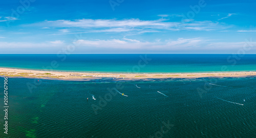 Tableau sur toile Aerial panorama of narrow sandbar between lagoon and Mediterranean Sea in the Eb
