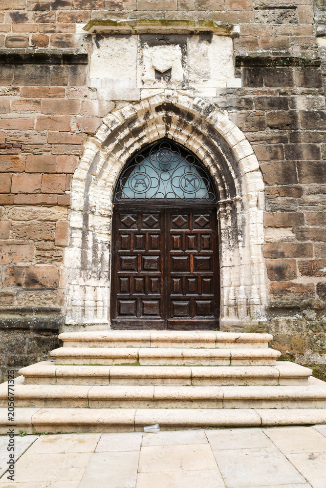 Fototapeta premium Entrance to San Antonio de Padua church in the old town of Aviles city, Asturias