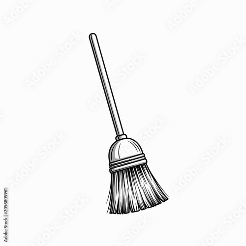 Broom with long wooden handle.