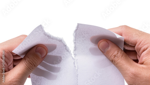 Billede på lærred Isolated hands tearing plain white paper apart, symbolizing separation and end concept