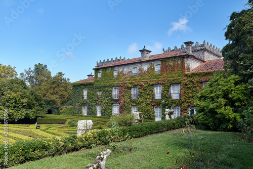 Building exterior with lawn and trees
