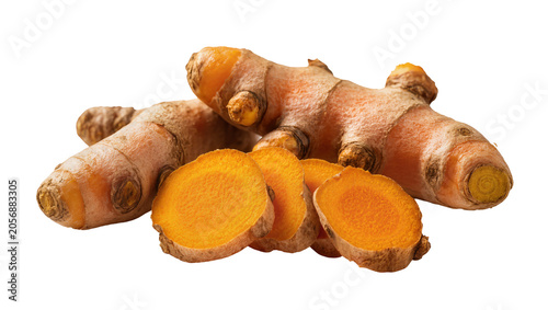 Fotografie Isolated fresh turmeric roots and sliced pieces showing vibrant golden-orange in