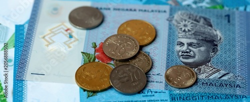 Photography Malaysian ringgit money bills and coins on table