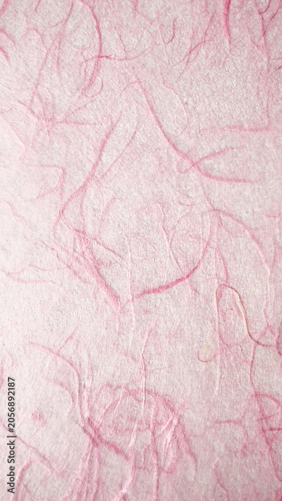 Fototapeta premium Soft pink handmade paper texture with visible fibers