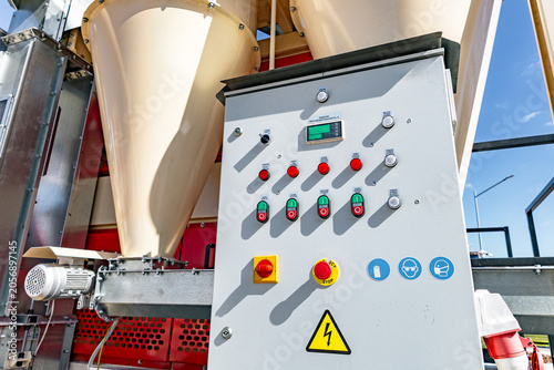 Εκτύπωση καμβά Gray metal control panel with buttons, switches, and indicator lights mounted in
