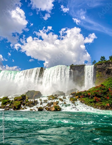 Majestic waterfall under blue sky