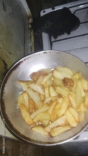 Deep Frying Potato Slices in Hot Oil