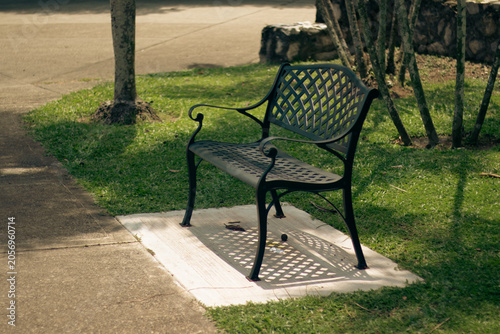 Black bench in the garden