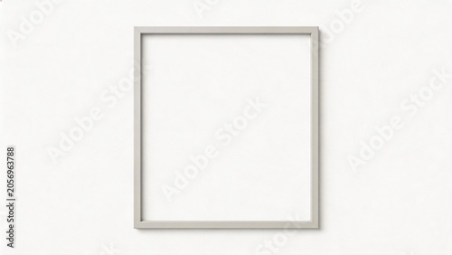 Empty picture frame on white wall