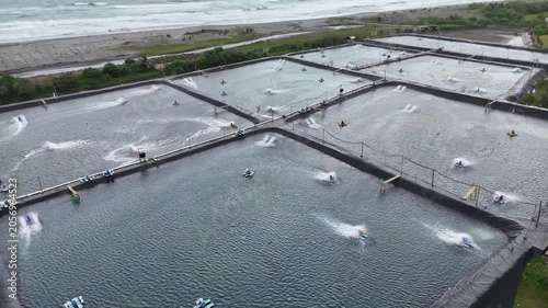 Aerial Drone View of Coastal Shrimp Farm Near Pantai Cemara Indonesia
