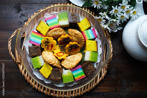 фотографія Traditional Malay Kuih Platter With Tea Setting