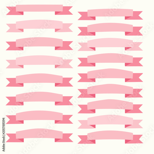 Ribbons are arranged in rows on a surface with various pink banners.