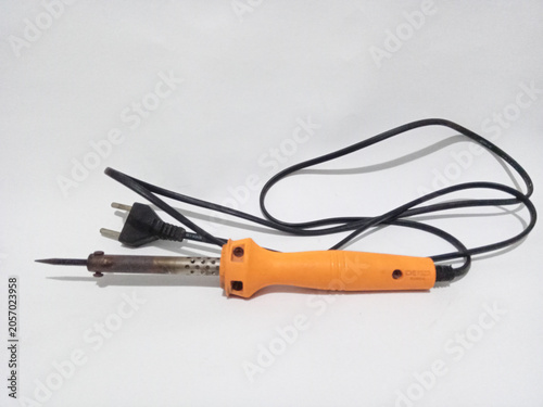 Obraz na płótnie Soldering iron with black cable and power plug