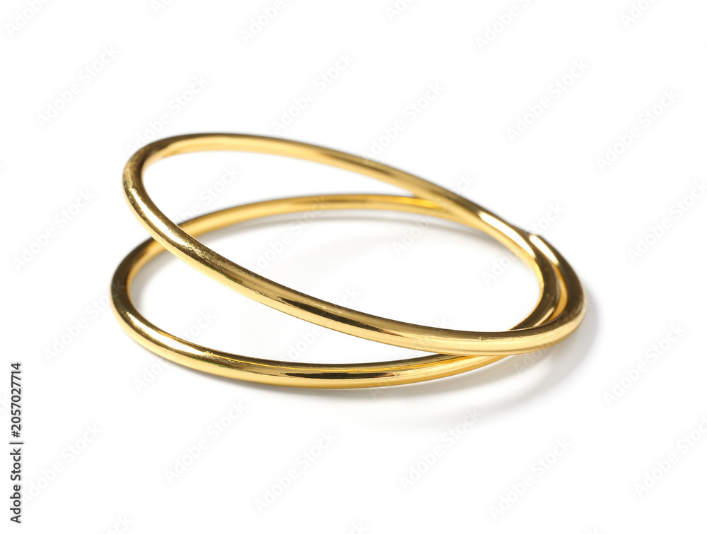 Naklejka premium Elegant gold ring with intertwined bands, luxury jewelry accessory, fashion and style, isolated on white background