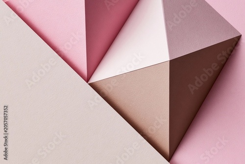 Geometric shapes in soft pink, beige, and brown tones