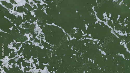 Obraz na płótnie Top Down View of Green River Water with White Foamy Bubbles