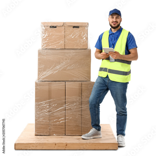 Smiling delivery man in saf...
