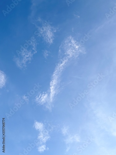 Blue Sky with Cirrus Clouds in Vertical Format.